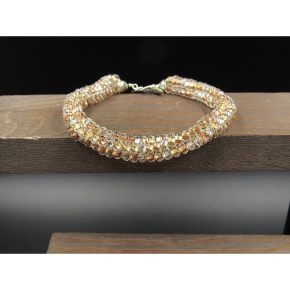 Jewelry - 7 Inch Sterling Silver Earth Tones Braided Bead Bracelet